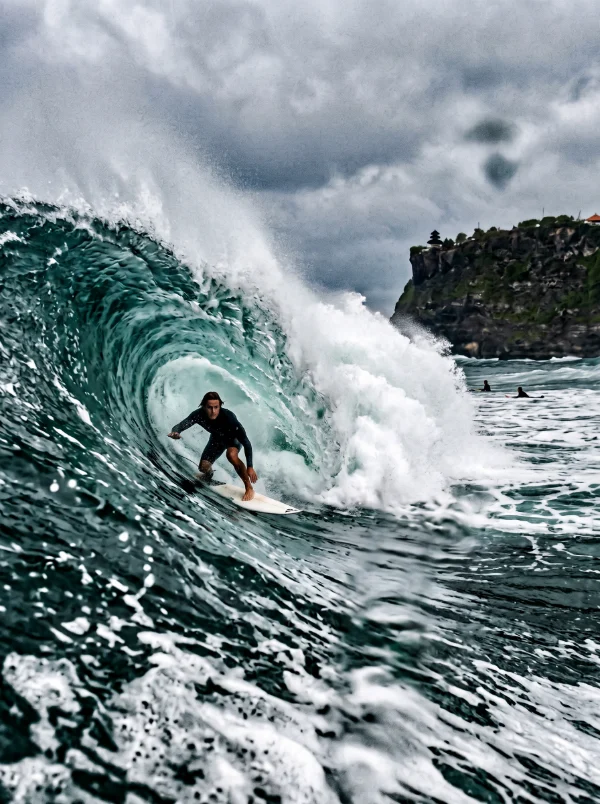 Deep in the barrel at Uluwatu, the cliff temple behind